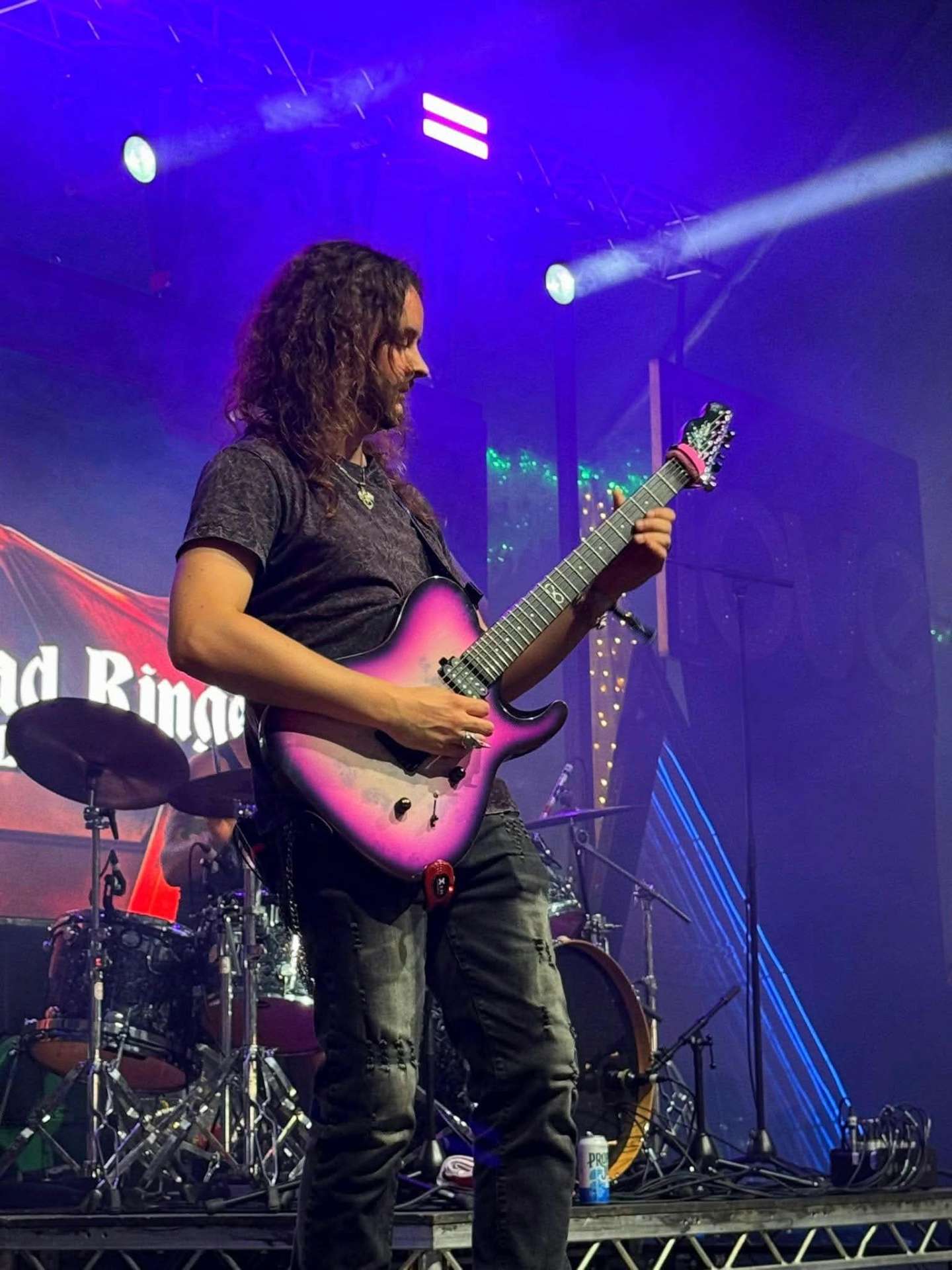 Mr Mike performing live on guitar